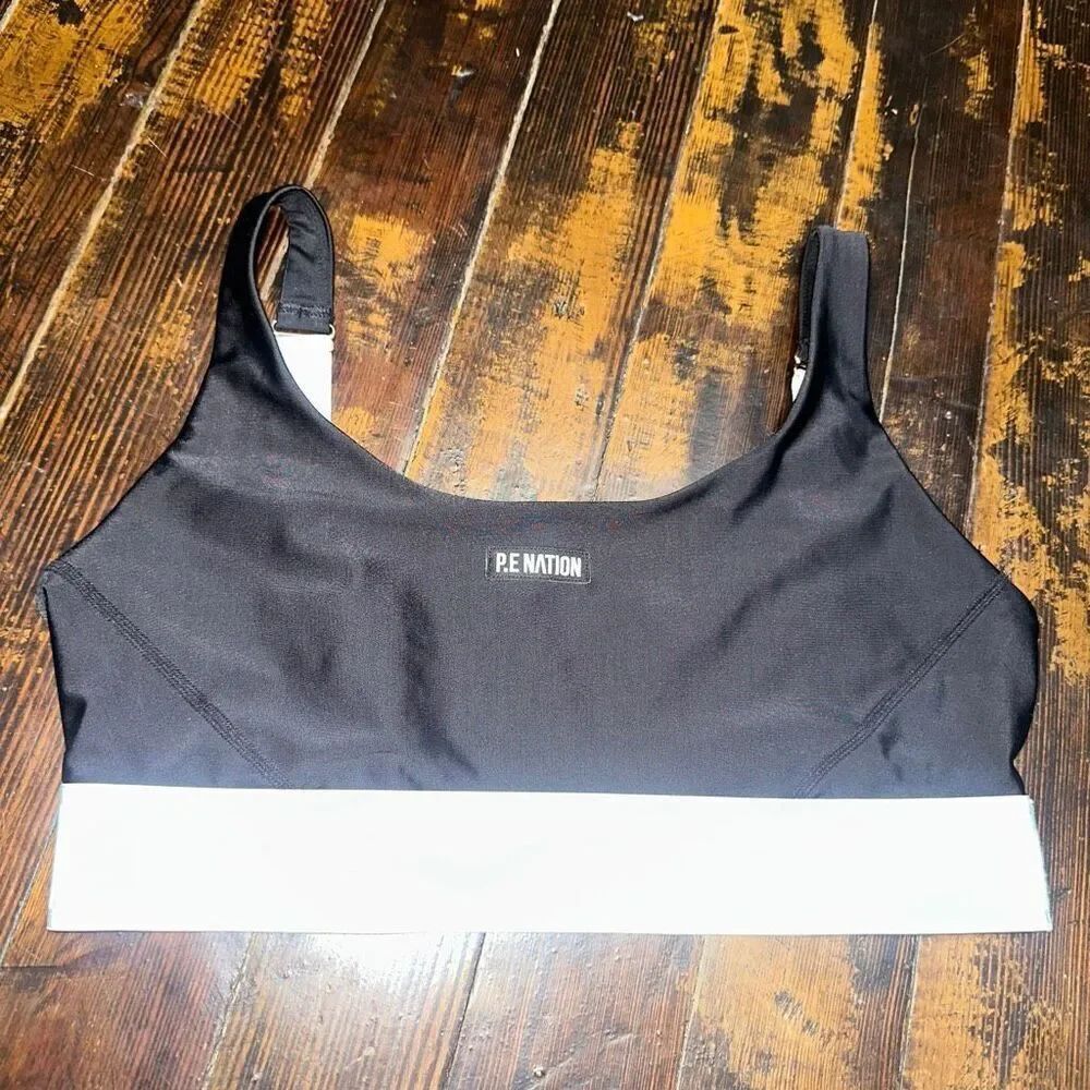 PE Nation black and white strappy Athleisure L sports bra